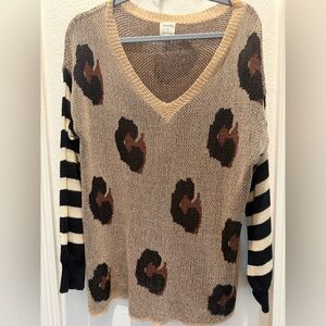 Amaryllis V-Neck Sweater with Animal Print and Striped Sleeves